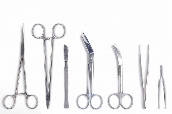 Surgeon tools – scalpel, forceps, clamps, scissors – isolated